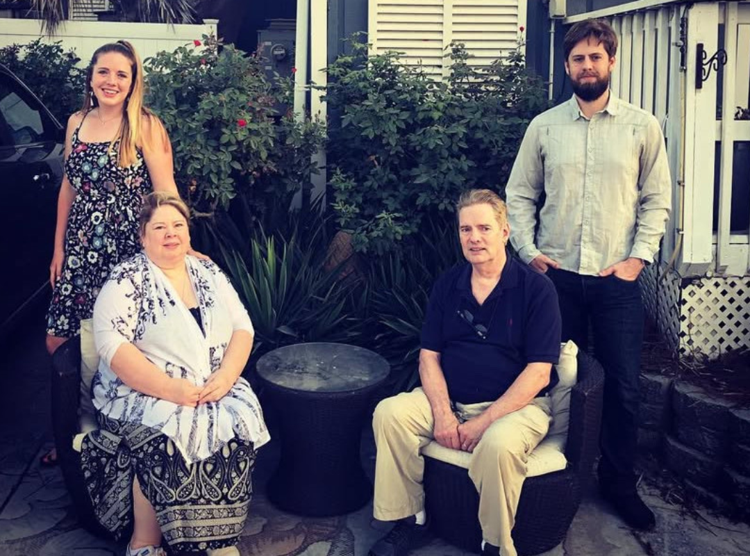 Lail Family picture with Ansley standing above her mother, who is seated. On the right is Ansley's brother, who is standing above their father, who is also seated.